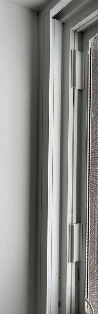 Clean window frame and track detail after bathroom detail cleaning.